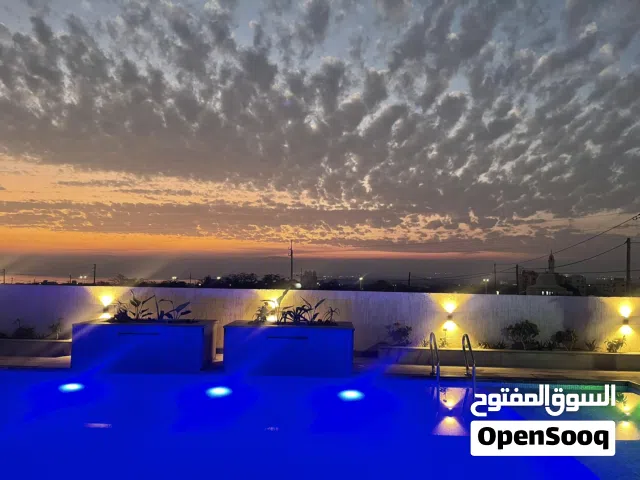 فيلا من 3 طوابق  تشطيبات فاخره وإطلاله رائعه على البحر الميت  Splendid villa with pool