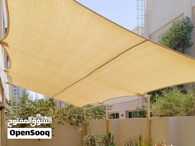 wall to wall Sail shadesمظلات شراعية تغطي الجدار بالكامل