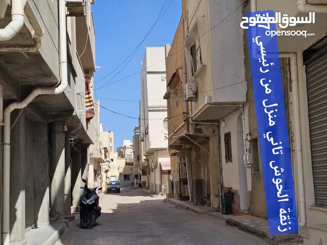 نص حوش طريق السور شهادة عقارية 3 طوابق