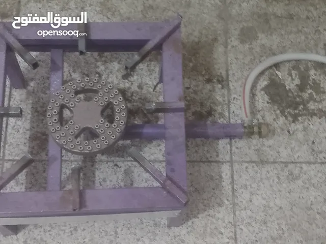 دبة غاز معبأ مع طباخ جديد