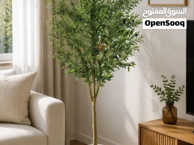 اشجار زينة صناعي مع قواوير