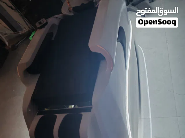 كرسي مساج مع جهاز للعنايه بالشعر تخت مساج