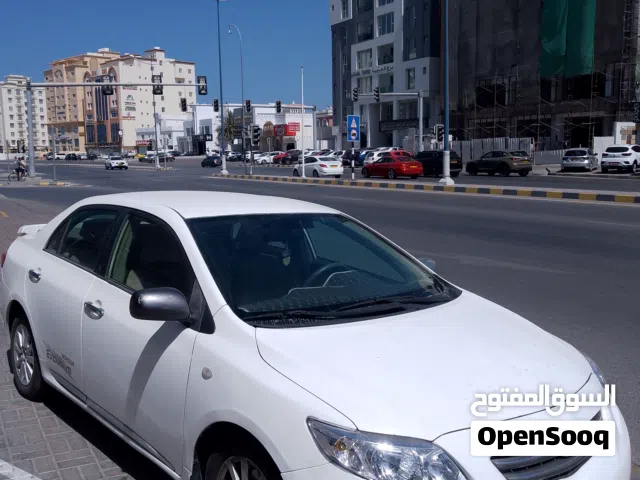 تويوتا كورولل صالون ابيض cc1600 2008