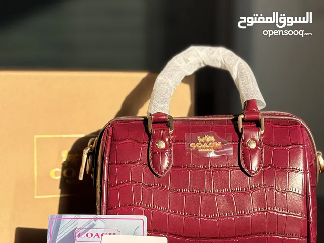 شنطة كوتش برغندي لميع 18 سم