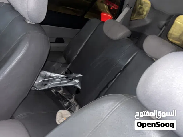 2009 كيا كارينز Standard