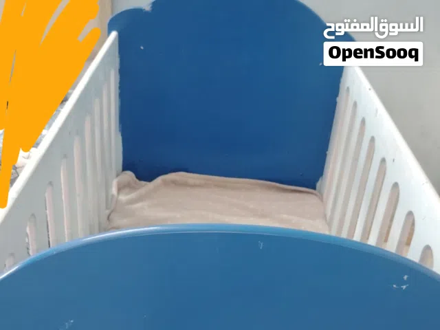 سرير اطفال خشبي