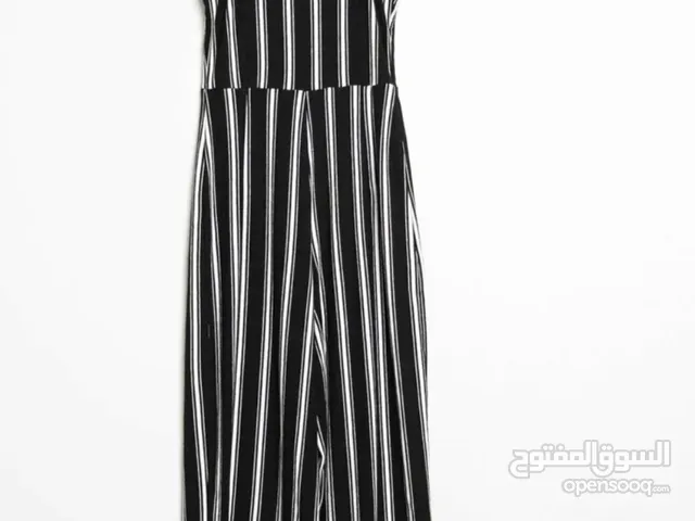 Black and white striped jumpsuit in size small