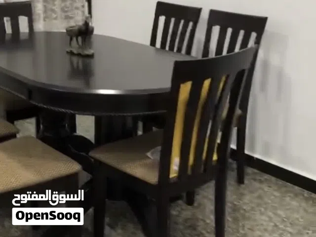 Dining room solid wood dark brown table with 6 chairs, 135 cm x 95 cm x 75 cm. BD199, negotiable