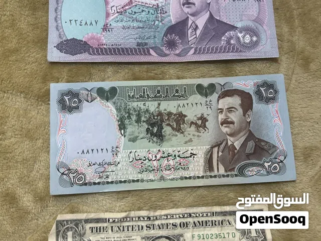 عملات صدام حسين ودولار
