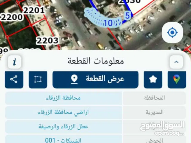 مجمع تجاري في حي الرشيد