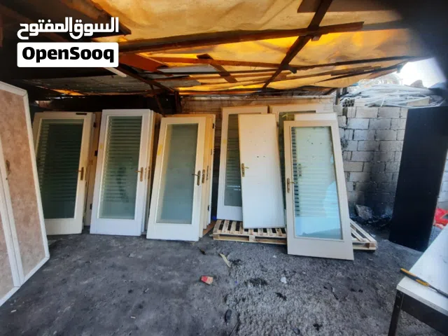 ابواب خشب ملبسه زجاج عدد 24