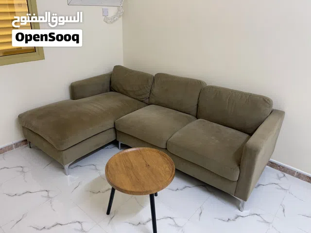 Comfortable sofa with round table