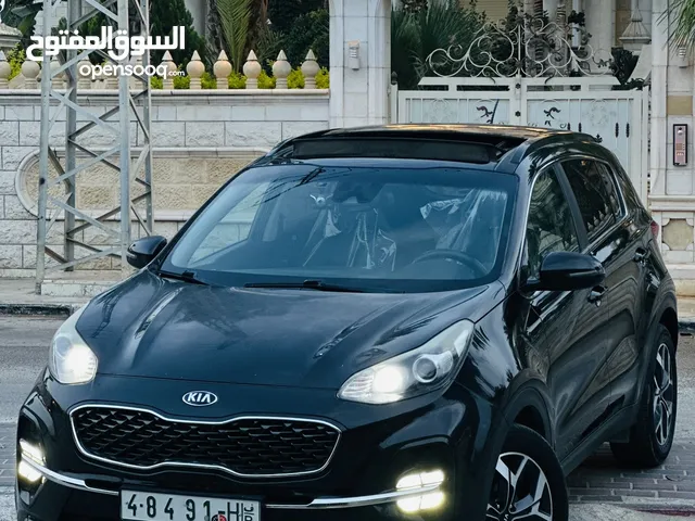 كيااا سبورتاج مطور 2000 بنزين 2*4 الجيب بالكراتين فل اضافات ملغم امكانية البيع نص بالنص الله يبارك