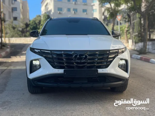 هونداي توسان ( هايبرد)  بنزين + كهرباء  فل الفل اضافات
