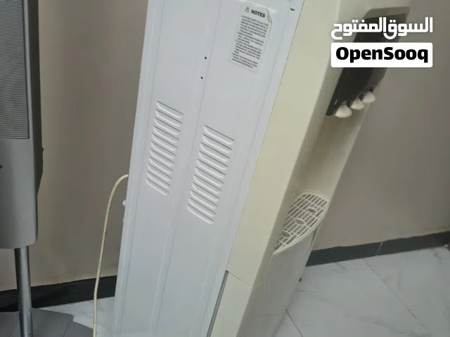 كولر ماء مع قارورة سحرية