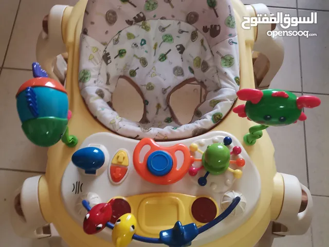 Baby walker with toy set to keep baby entertained
