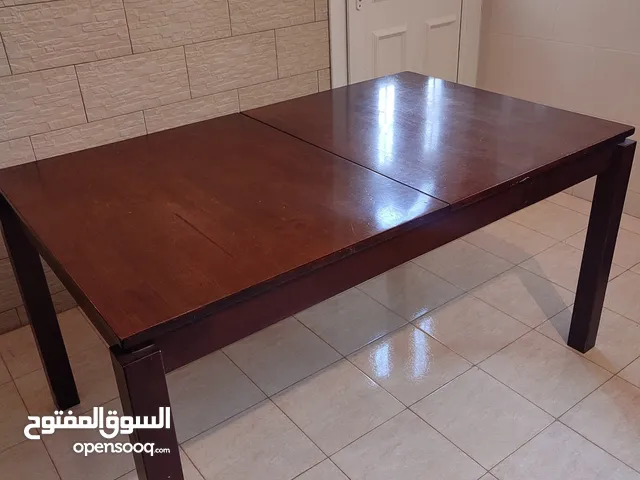 طاولة أكل 6 الى 8 مقاعد