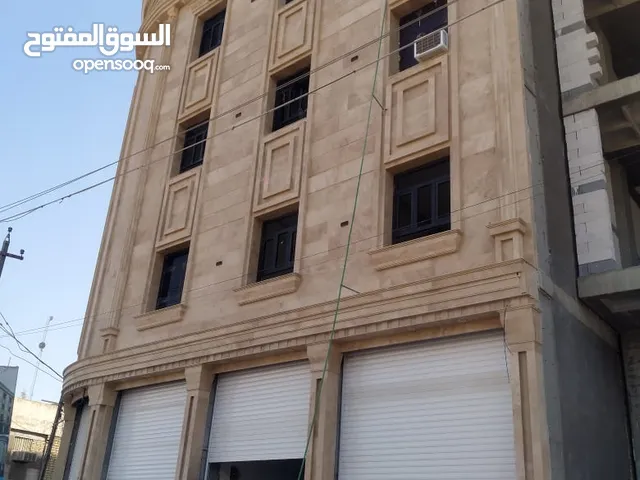 بنايه كامله للايجار حديثه البناء موقع تجاري ممتاز 3 طوابق تحتوي 9 شقق