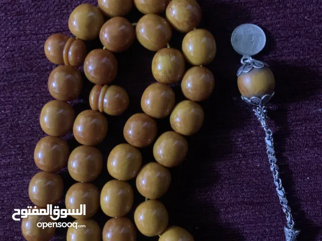 سبحة كهرب مغلف قديمة 33 حبة عدا شاهود