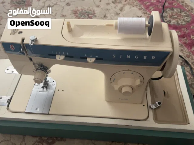 ماكينة خياطة و درز سنجر الاصليه بحالة ممتازه