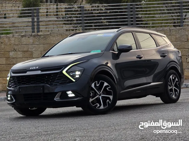 كيا سبورتاج هايبرد 2023 - فل كامل مع بانوراما - غرفة مميزه - عداد قليل اصلي - إمكانية التقسيط.