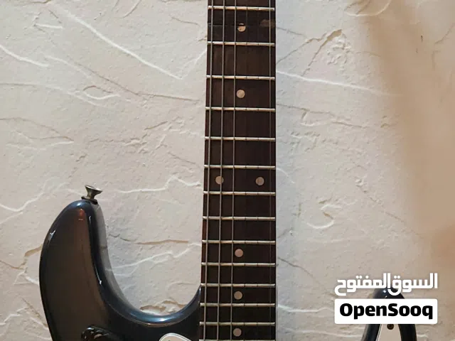 samik guitar and fender amply