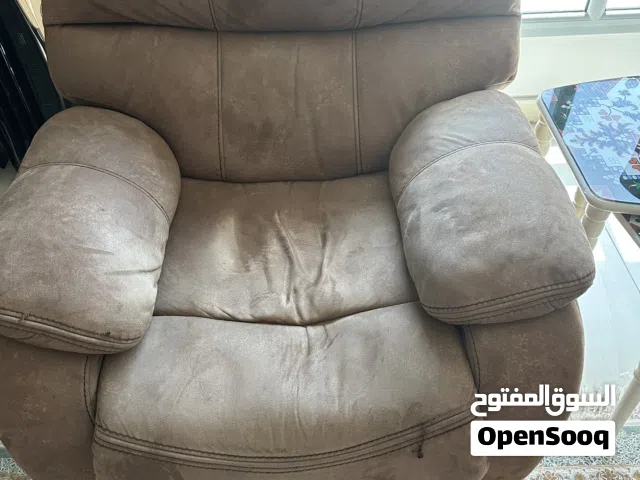 كرسي بذراعين ركلاينر