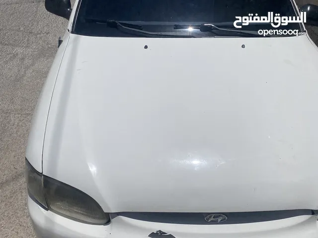 هونداي اكسنت موديل 1997 لون ابيضّ الدب