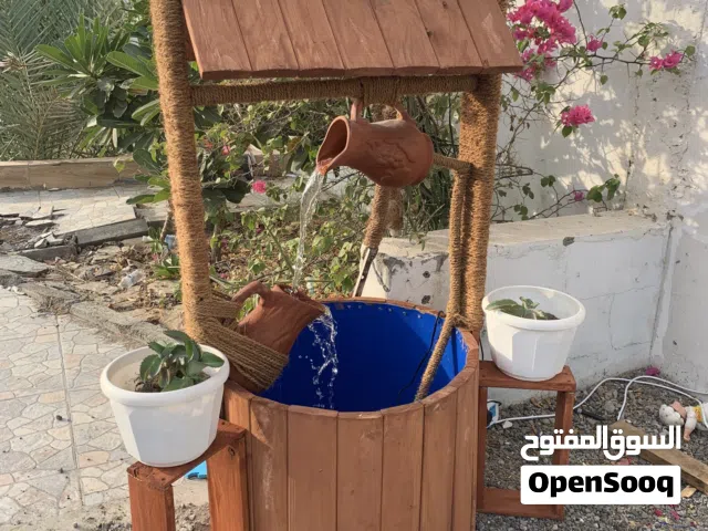 نوافير خشبية شكل بئر متنقلة كبيرة يوجد توصيل صلالة