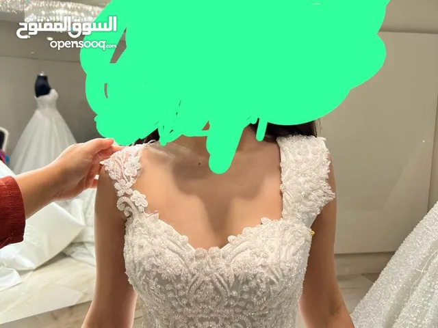 فستان عروس غير ملبوس