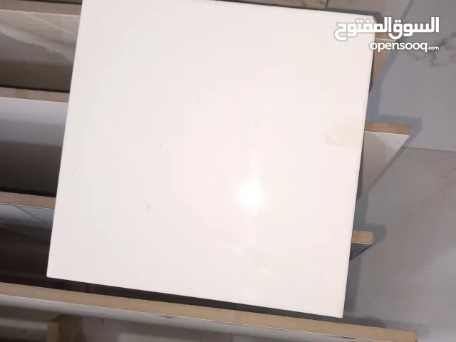 بورسلين ايطالى لون ابيض 40×40 أرضية خارجى وبوستين اسبانى 45×45 لون بيجى وارصاصى على 38