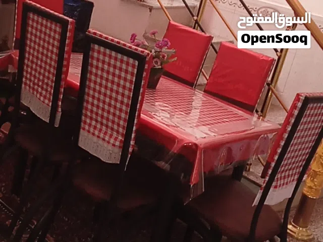 ميز طعام نظيف مع 6 كراسي