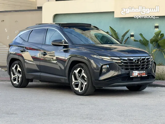 هونداي توسان 2022 هايبرد plug in 4*4 فل اضافات مع بانوراما 271 حصان