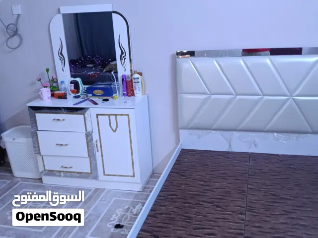 bed and metres . kabad ..dressing table