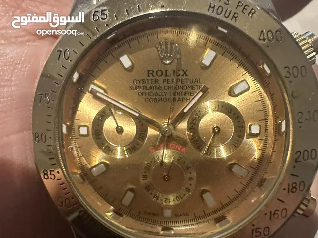 Rolex gold daytona