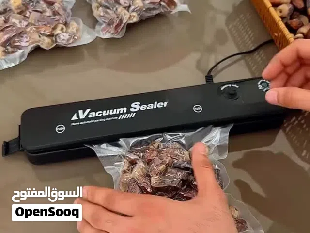 جهاز شفط وتغليف التمور والاكياس الخاصه بهن