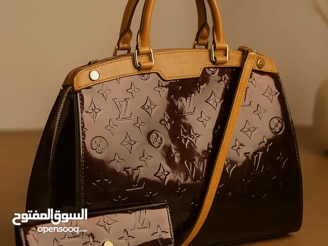 Burgundy Louis Vuitton for sale  in Hawally
