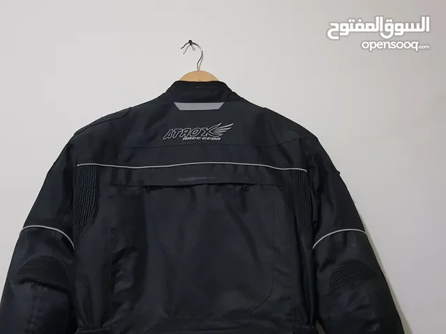 Raiders jacket  size xl brand Atrox race gear waterproof  in brand new only 1 time use  Only  38 kd