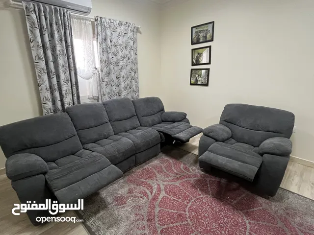 5 seater sofa- with 3 reclining chairs