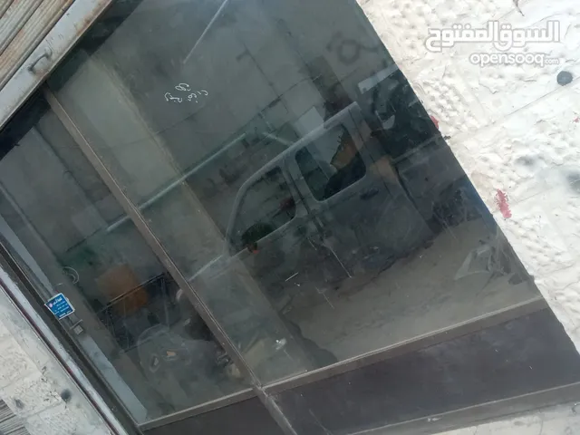 واجهه المونيوم زجاج سيكوريت باب سحاب بابين منفصلات بحاله ممتازه زجاج سيكوريت راكب جديد من حوالي شهر