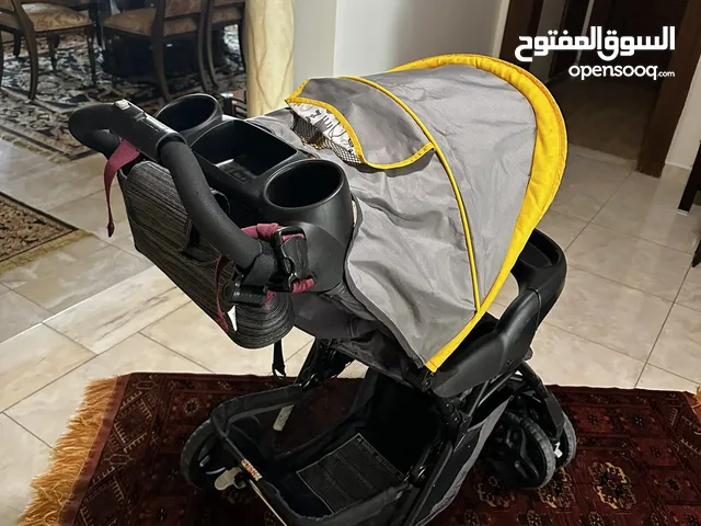 عرباية اطفال مع مقعد سيارة نوع GRACO