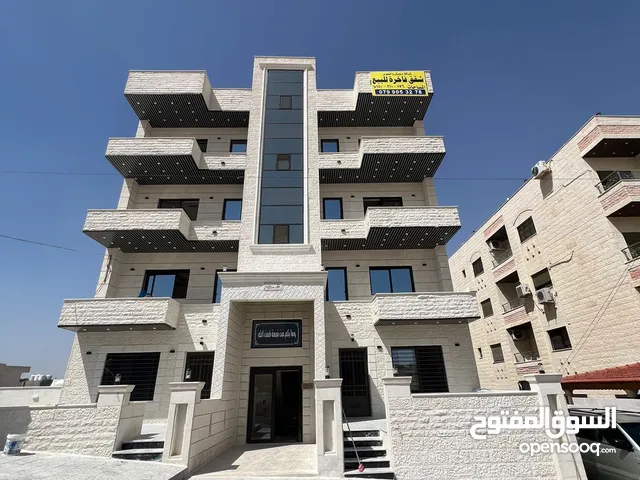 شقة ارضية سوبر ديلوكس حديثة 177 متر + تراس امامي وموقف خاص /الجبيهة المنصور
