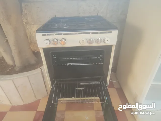ثلاجه +فرن غاز كهربا بوضع جيد مافي مشاكل شغال100ل 100