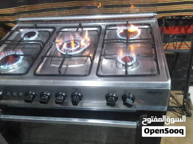 فرن خمس عيون شبه جديد متكامل مع صحونه وزجاج فوق استيل نضيف جولدن جاز مجرب وضمانه صيانمن اي عيب