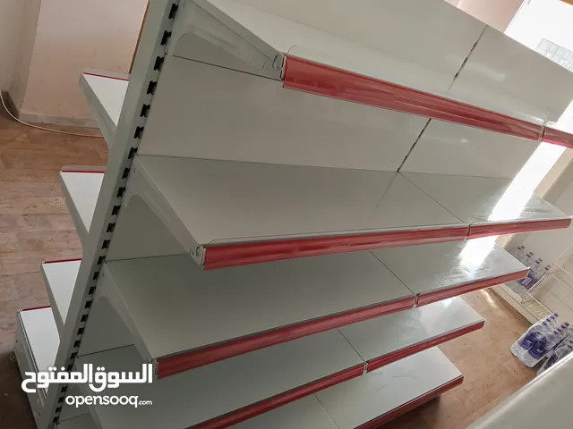 رفوف معدنية حائط وسطية لسوبر ماركت لون أبيض للبيع.