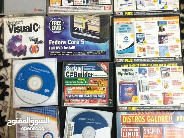 مجموعة من ال CD_DVD المتعلقة بالبرمجيات و IT