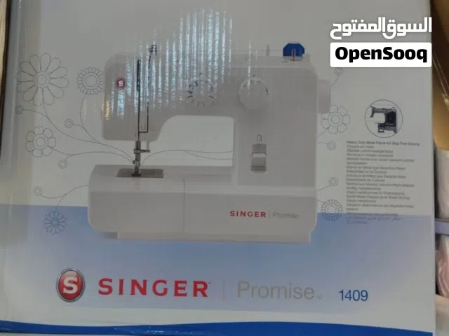 ماكينة خياطة سنجر منزليه