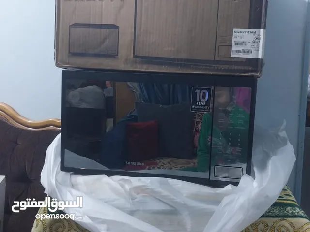 ميكرويف سامسونج بشواية اسود