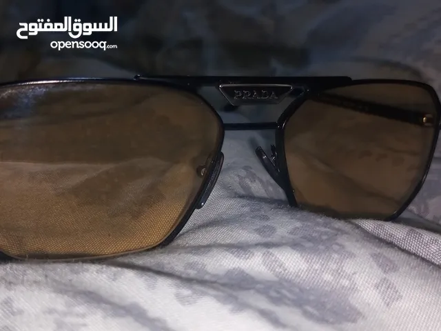 Prada sunglasses, model SPR 58Y 1BO-0B7 1N