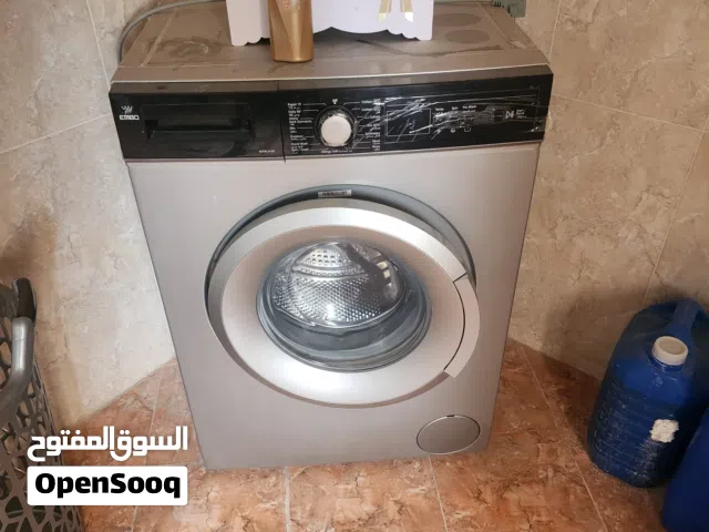 غسالة ملابس عدسه